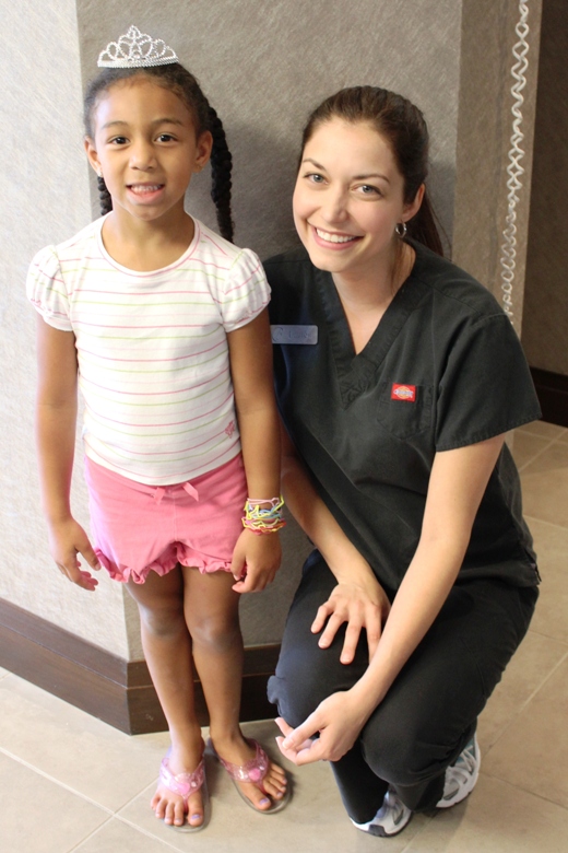 smiling patient with dental hygienist